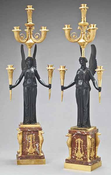 Appraisal: A Monumental Pair of Gilt and Patinated Bronze Figural Candelabra