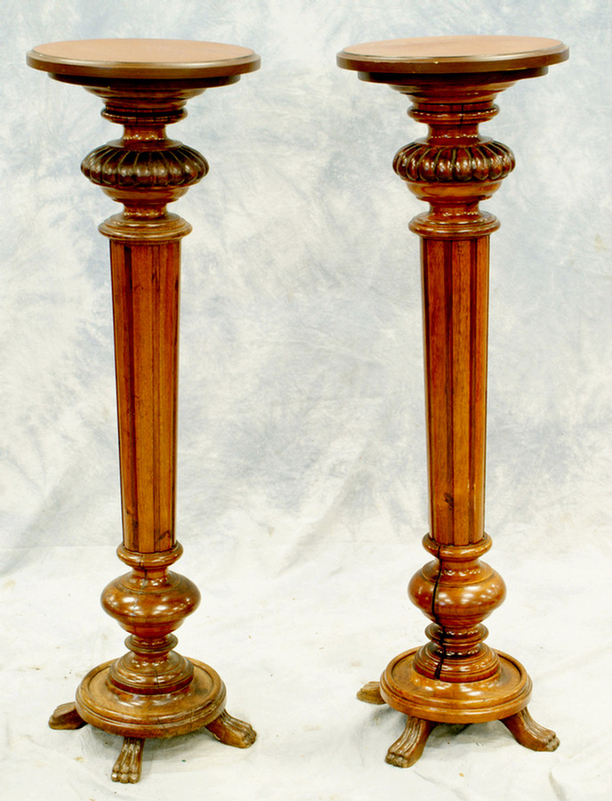 Appraisal: Pr Continental walnut pedestals splits along each column tall Estimate