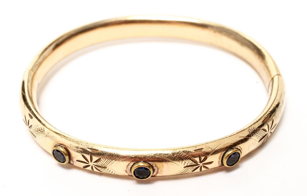 Appraisal: Gold-Filled Three Sapphires Bangle Bracelet Gold-filled engraved and chased with