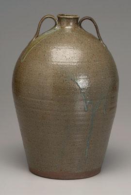 Appraisal: Alkaline glazed stoneware jug two strap handles glaze runs at