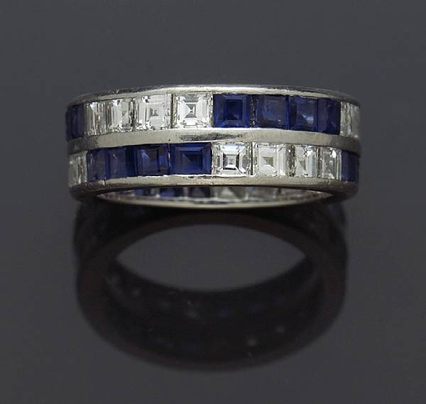 Appraisal: A square-cut diamond and sapphire double row eternity band reference