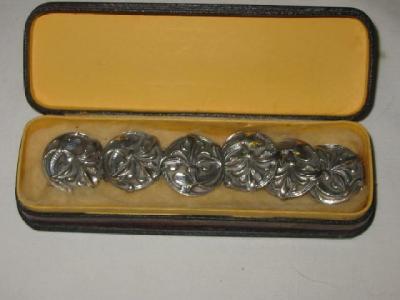 Appraisal: A SET OF SIX ART NOUVEAU BUTTONS of circular form