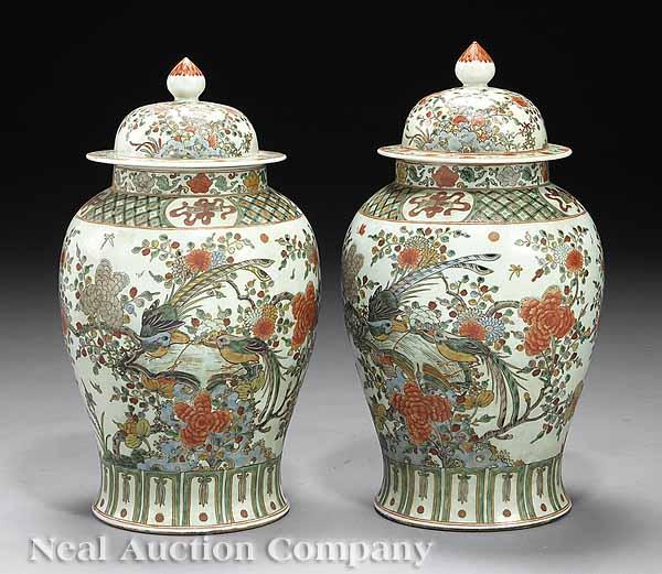 Appraisal: A Pair of Antique Chinese Famille Rose-Style Porcelain Covered Urns