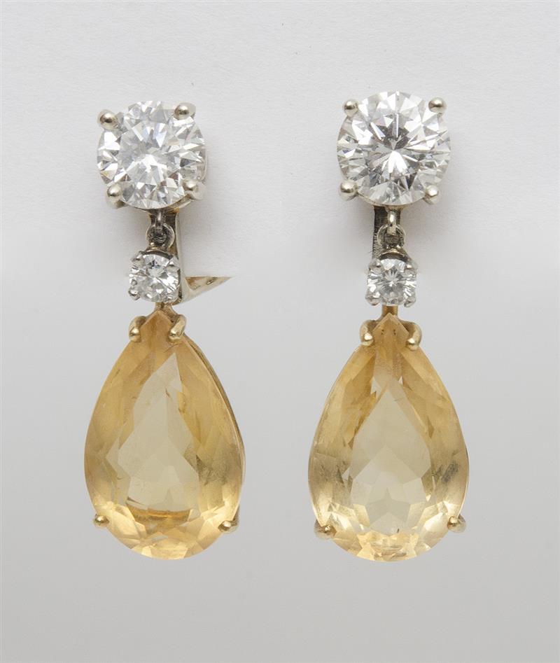 Appraisal: PAIR OF K GOLD DIAMOND AND YELLOW SAPPHIRE EARCLIPS The