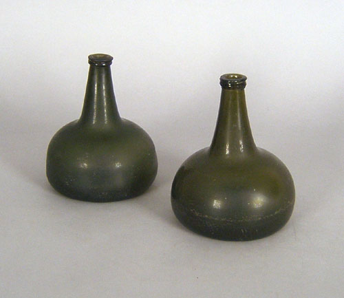 Appraisal: Two green glass squat bottles th c h and h