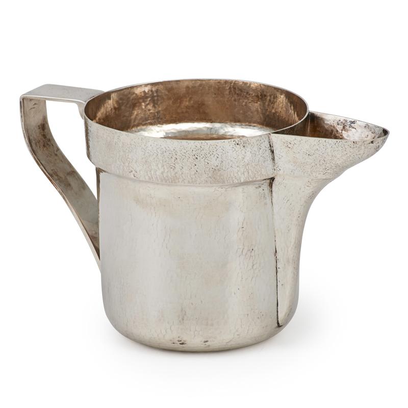 Appraisal: BUCCELLATI ITALIAN SILVER WATER PITCHER Textured and spot hammered x