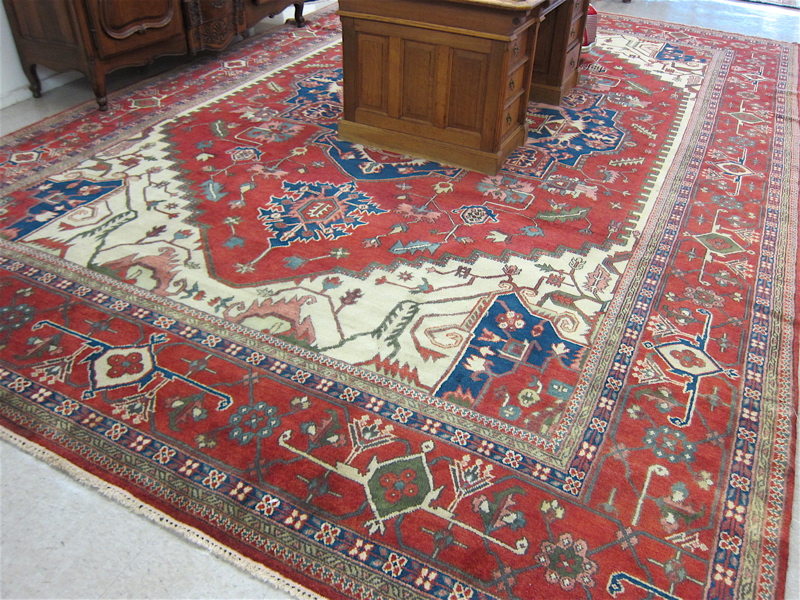 Appraisal: HAND KNOTTED ORIENTAL GRAND ROOM CARPET Persian Serapi design featuring