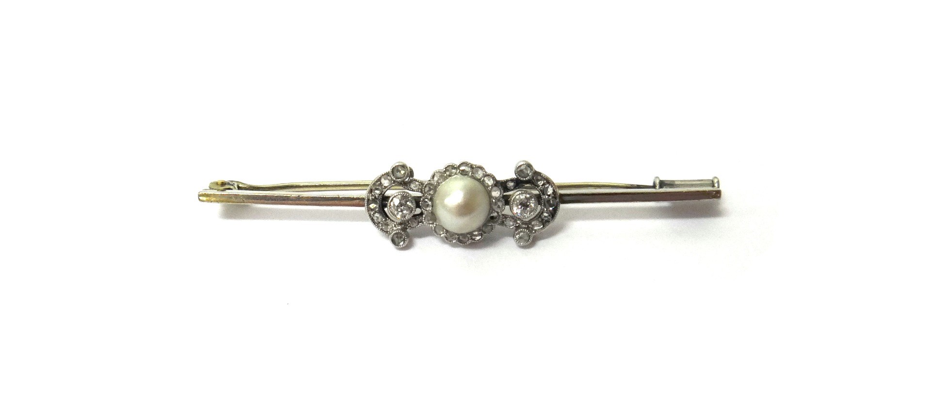 Appraisal: A diamond and cultured pearl set bar brooch mounted with