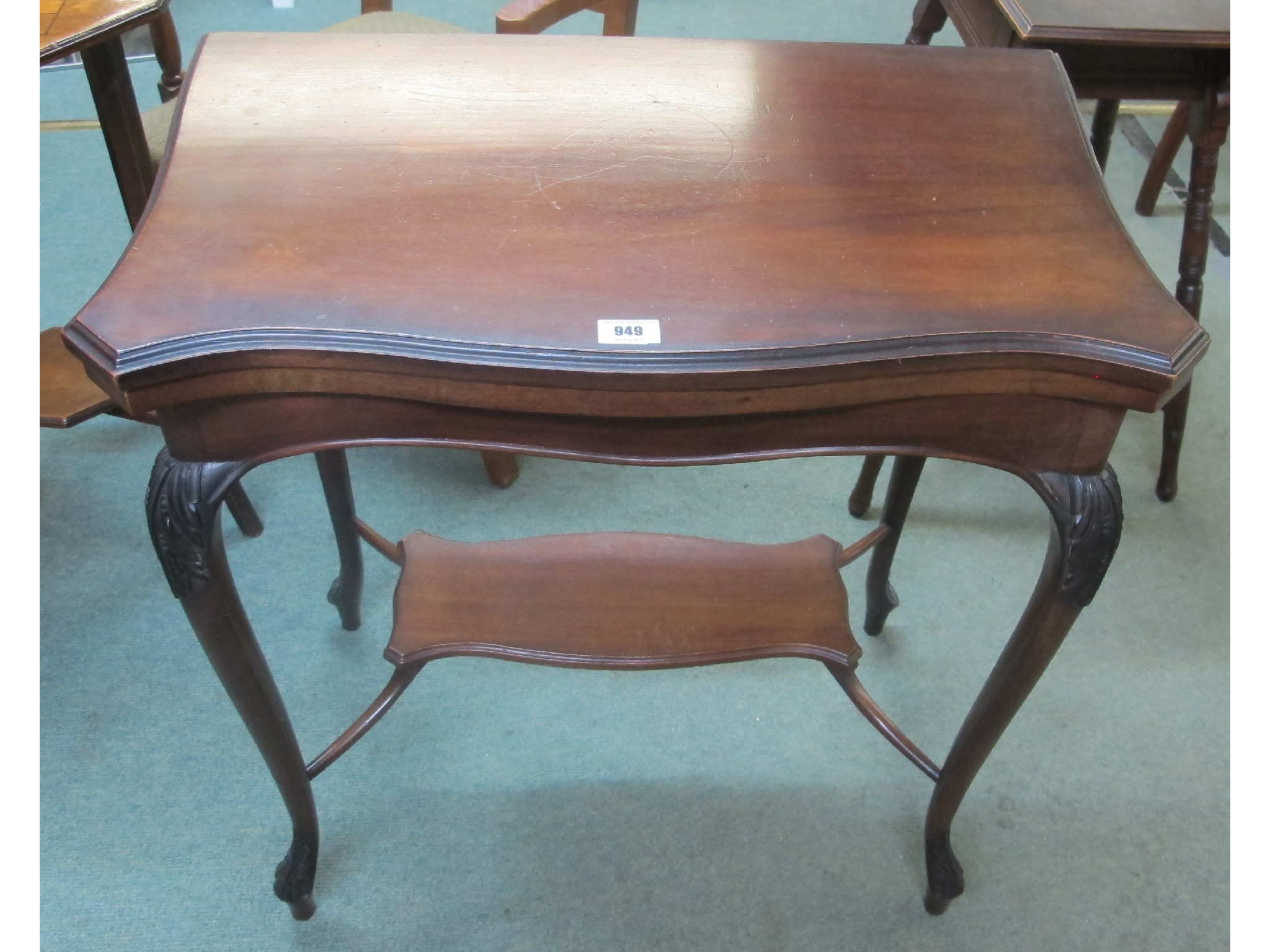 Appraisal: Victorian mahogany two tier card table