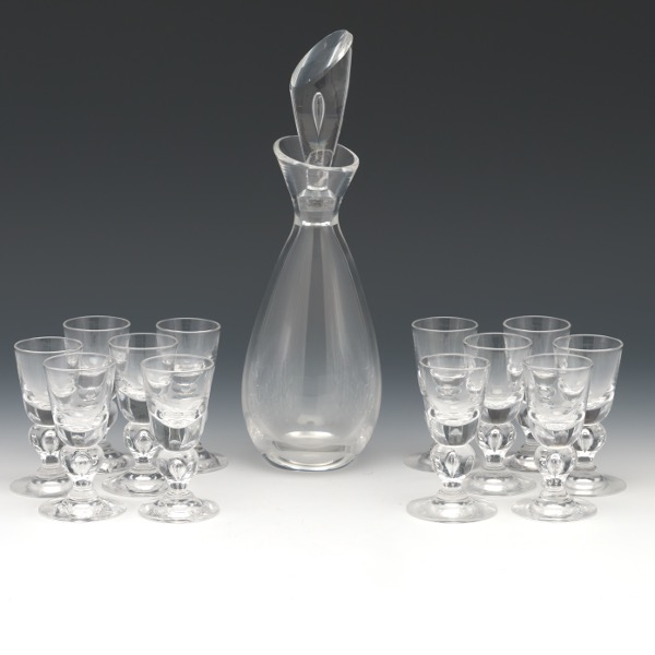 Appraisal: TWELVE STEUBEN APERITIF GLASSES WITH CONTROLLED BUBBLE AND DECANTER glass