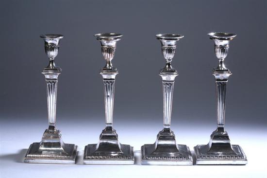 Appraisal: FOUR GEORGE III SHEFFIELD PLATE CANDLESTICKS early th century Pedestal