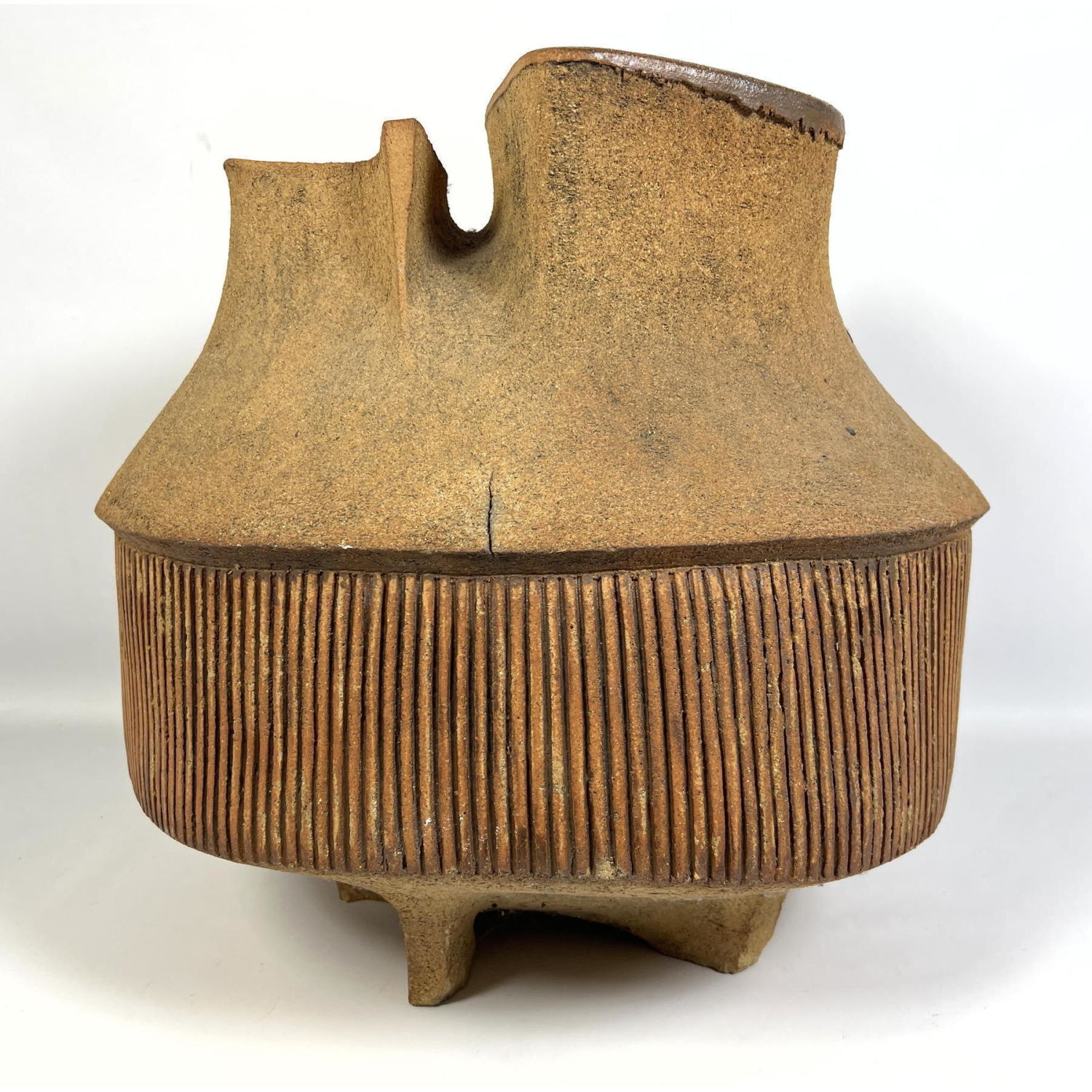 Appraisal: Large Asymmetrical Earthen Architectural Planter Vase Carved body Studio pottery