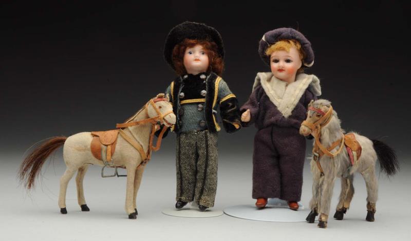 Appraisal: Lot Of Horses Boy Dolls Both French bisque heads one