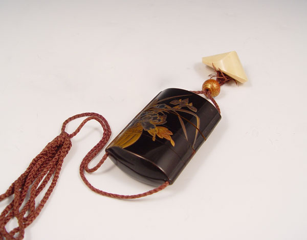 Appraisal: JAPANESE LACQUER INRO WITH BONE NETSUKE Four section inro ''