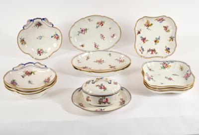 Appraisal: Eleven S vres dessert dishes and an oval sugar bowl