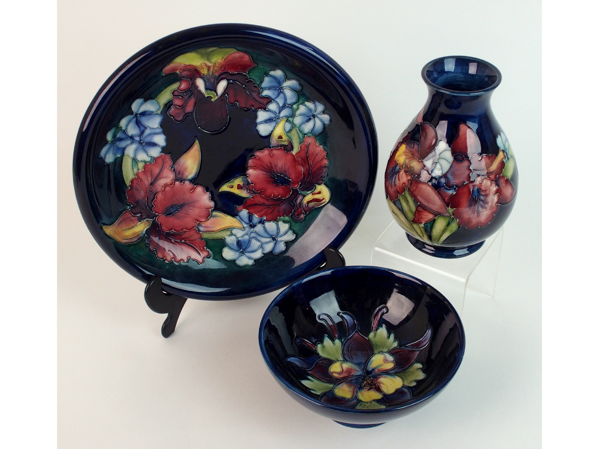 Appraisal: Three pieces of Moorcroft pottery Frilled Orchid and ColumbineFrilled Orchid