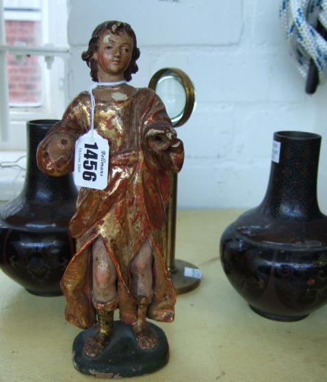 Appraisal: A polychrome wooden carving of a saintly figure th century