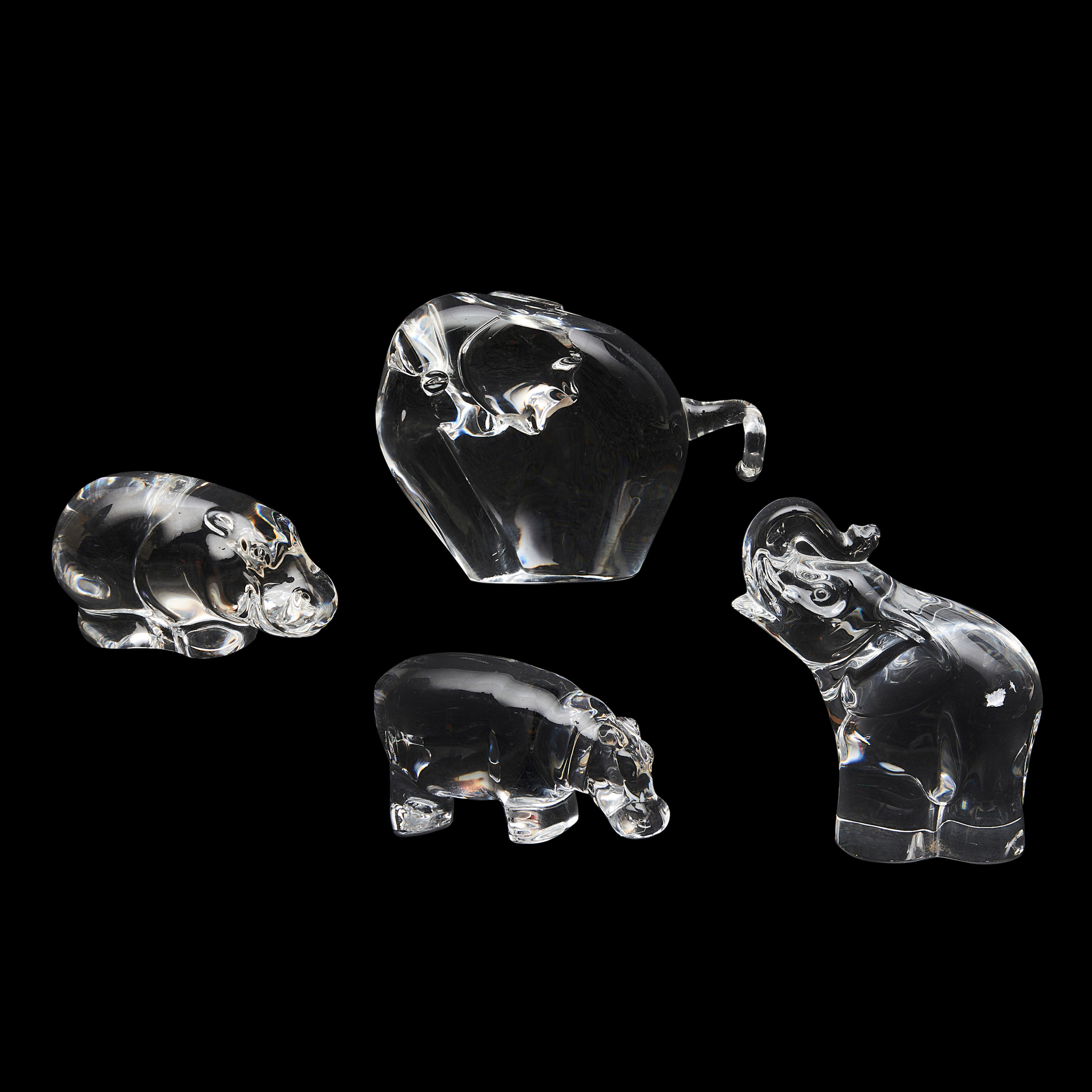 Appraisal: FOUR MODERN GLASS ANIMAL FIGURES including an unmarked elephant a