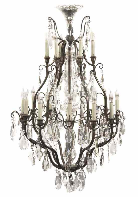 Appraisal: A French Eighteen-Light Chandelier of cage form the faceted glass