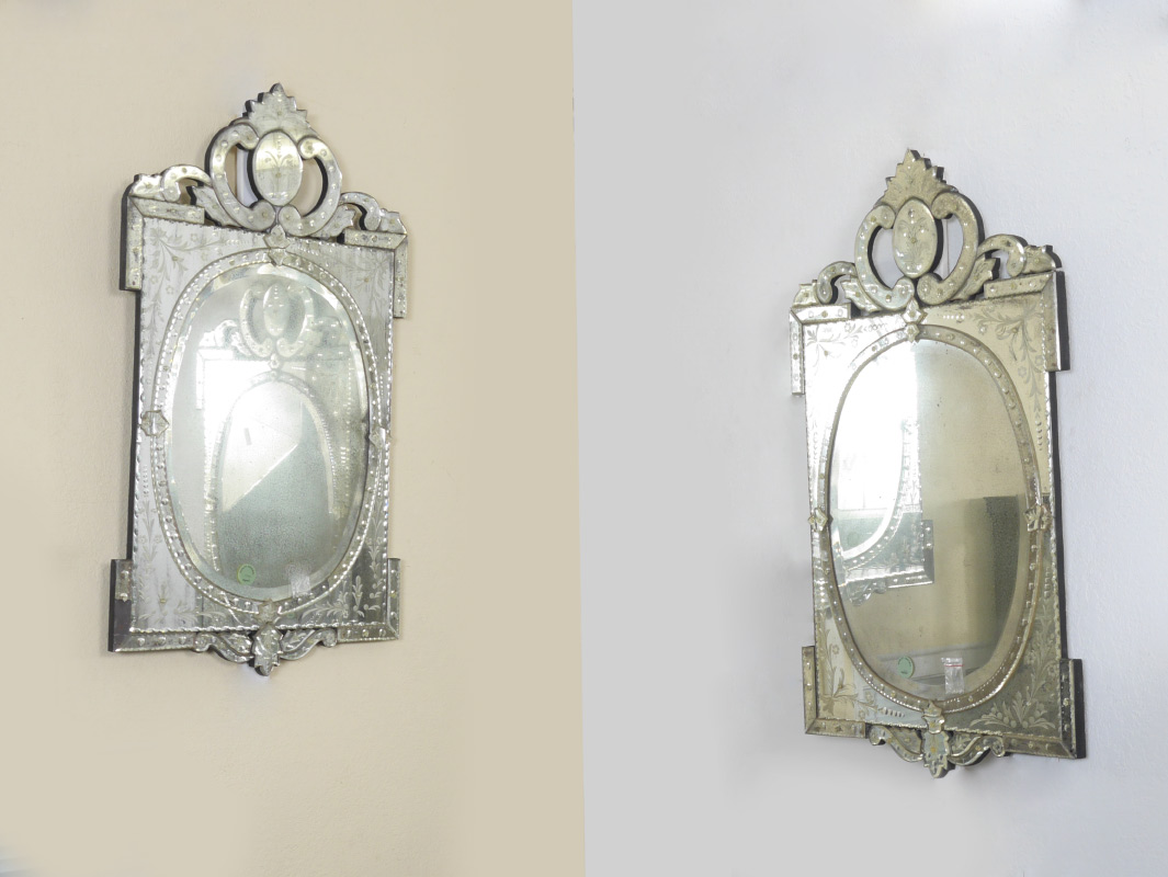 Appraisal: PAIR VENETIAN STYLE MIRRORS Contemporary with an antiqued appearance measures