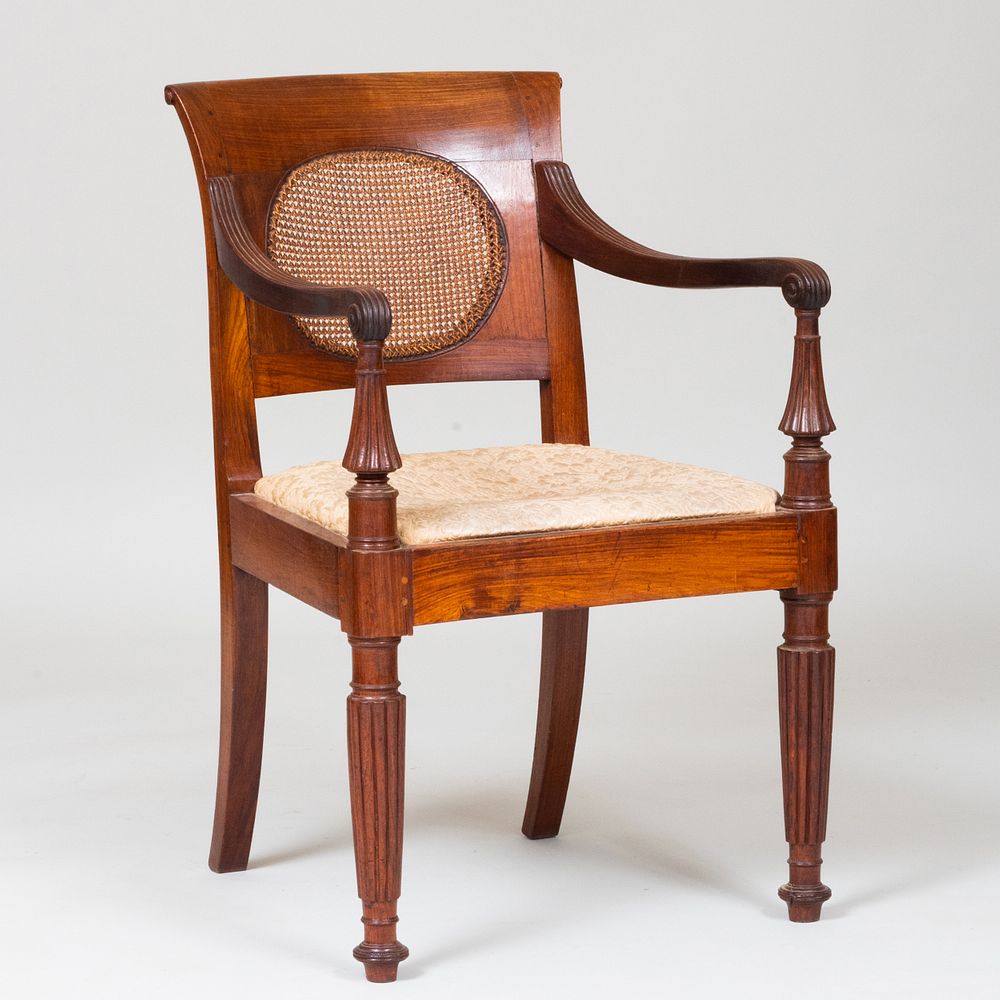 Appraisal: Anglo Indian Teak and Caned Armchair x x in Condition