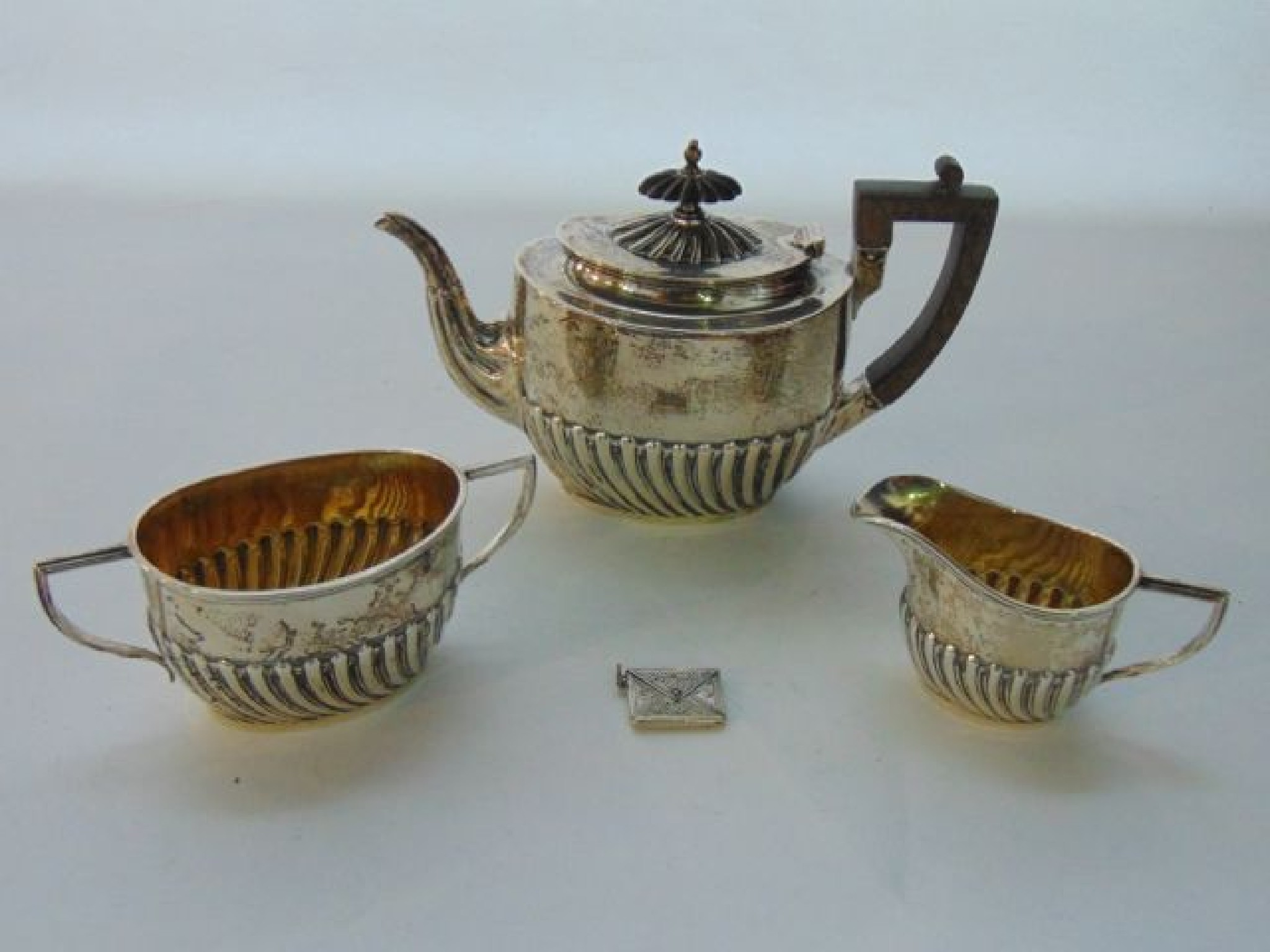 Appraisal: A late Victorian silver three-piece tea set Walker Hall Sheffield