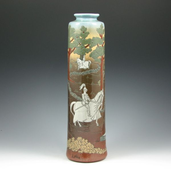 Appraisal: Weller glossy Dickensware vase with knights maiden and a castle