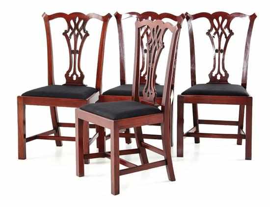 Appraisal: Four Chippendale style carved mahogany sidechairs curved crest above pierced