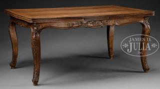 Appraisal: LOUIS XV STYLE CARVED WALNUT DRAW-LEAF DINING TABLE Carved overall