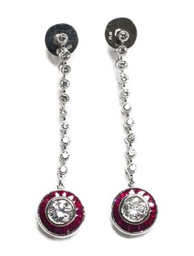 Appraisal: ART DECO-STYLE EARPENDANTS Art Deco-style platinum earpendants each centering on