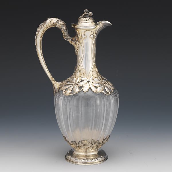 Appraisal: FRENCH SILVER AND GLASS AESTHETIC MOVEMENT CLARET JUG Claret jug