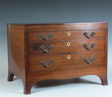 Appraisal: A th century mahogany miniature chest with boxwood and ebony