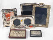 Appraisal: Three silver faced strut backed photo frames x x and