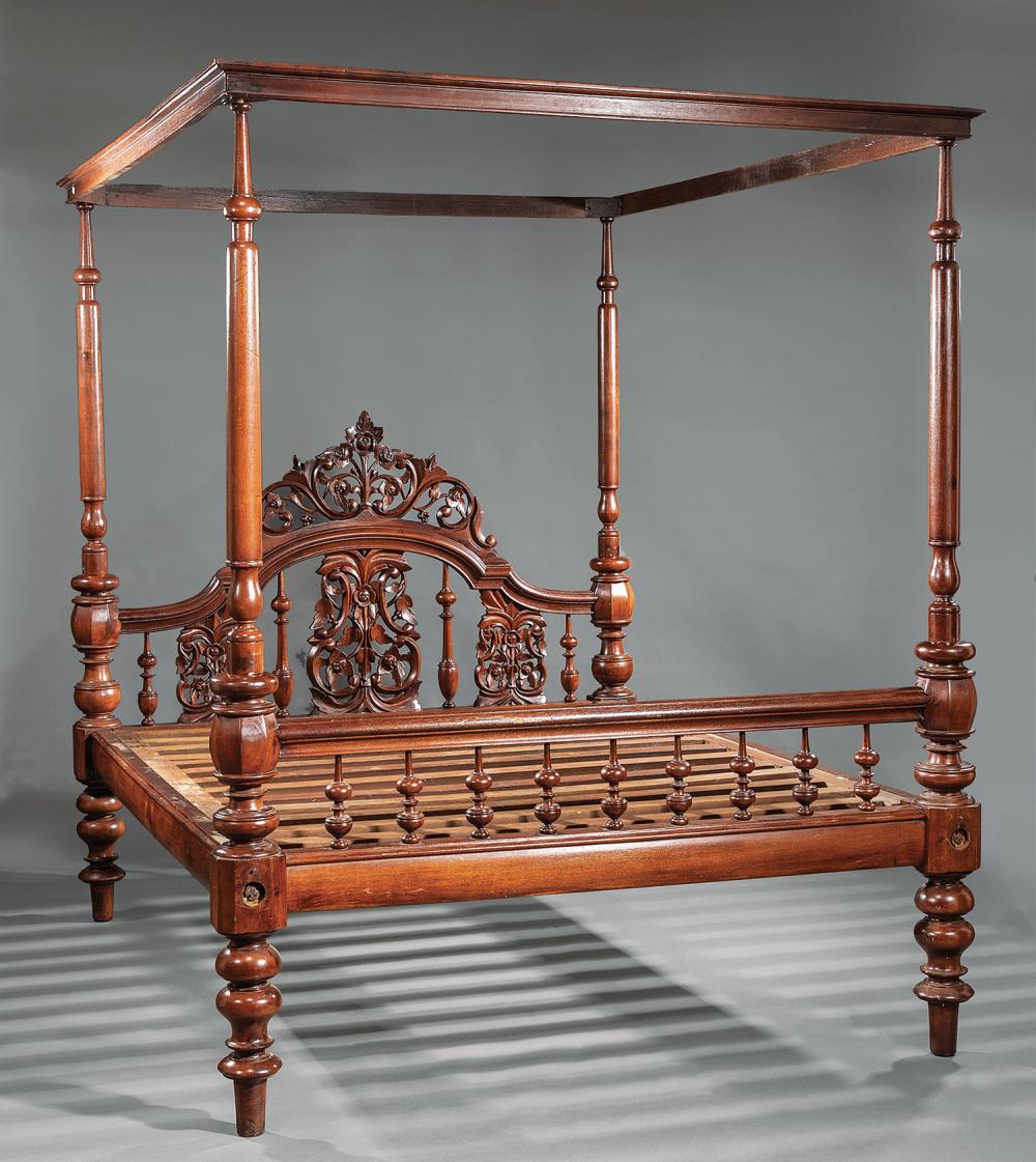 Appraisal: Anglo-Colonial Carved Tropical Hardwood Bedstead molded tester turned posts floral-carved