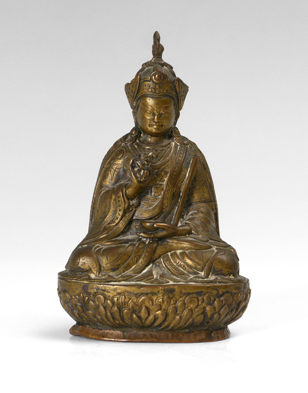 Appraisal: TIBETAN SEATED BRONZE BUDDHA Seated on lotus blossom in dhyanasana