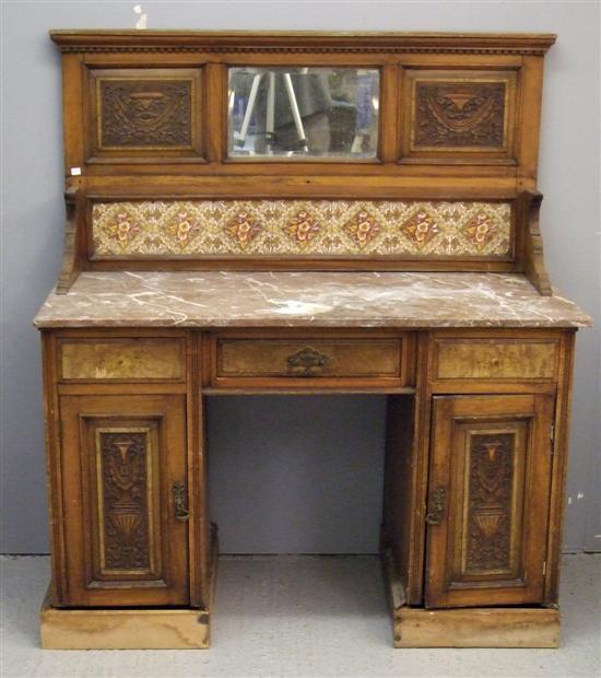 Appraisal: th century Maples style walnut marble topped kneehole washstand raised