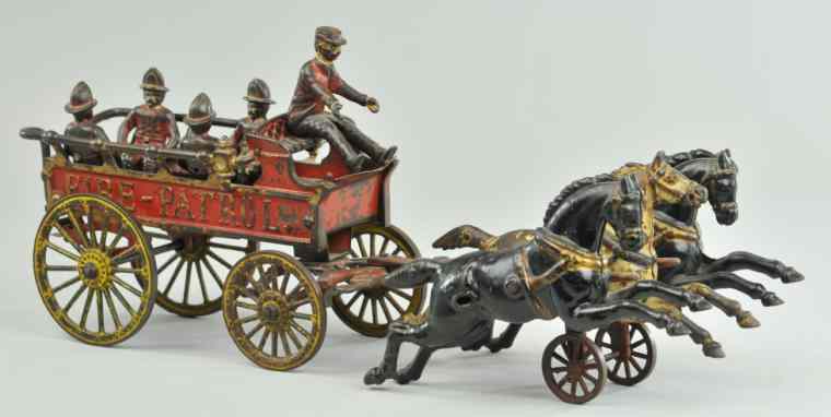 Appraisal: KENTON HORSE DRAWN FIRE PATROL Cast iron painted in red