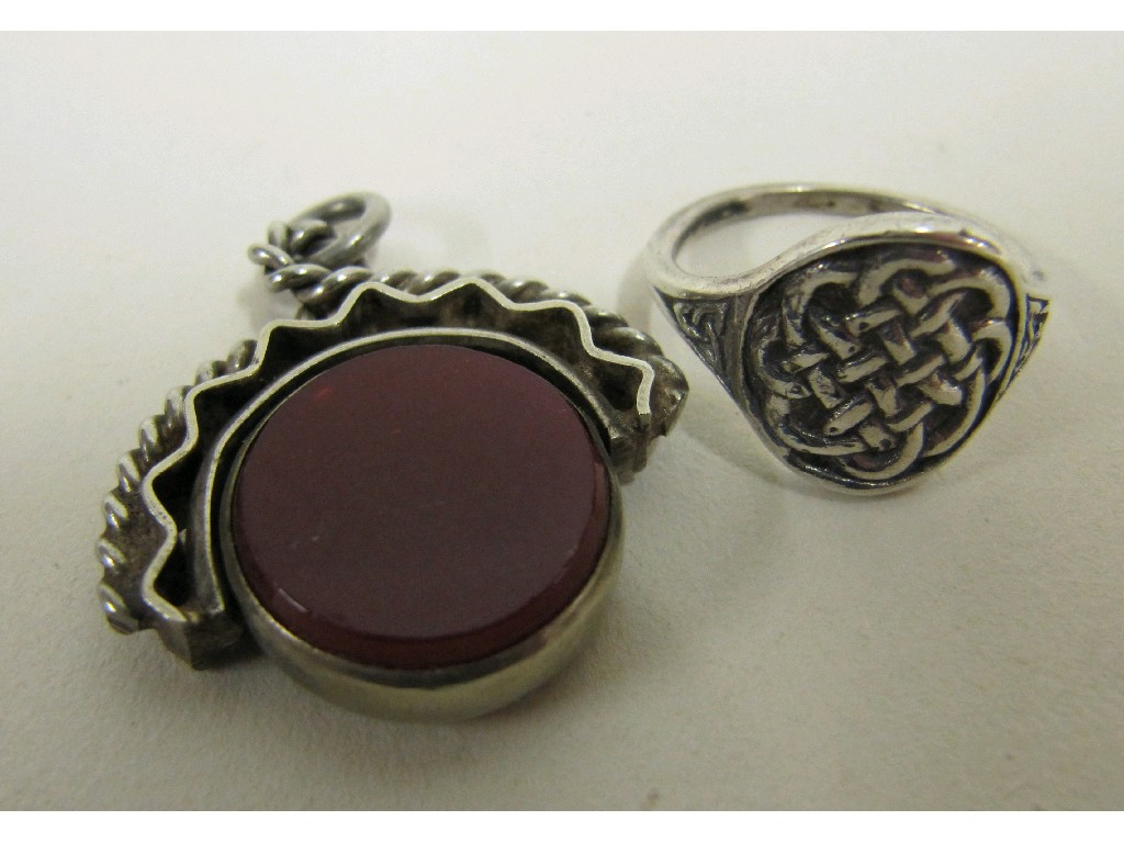 Appraisal: John Hart Iona silver ring and a silver mounted swivel