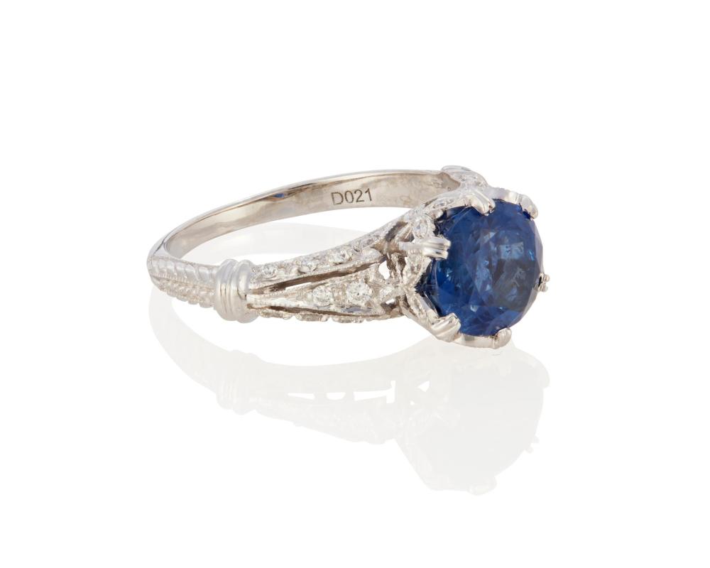 Appraisal: A SAPPHIRE AND DIAMOND RINGA sapphire and diamond ring k