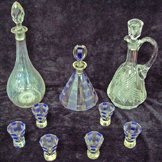 Appraisal: An Art Deco decanter and six glasses of stylised form