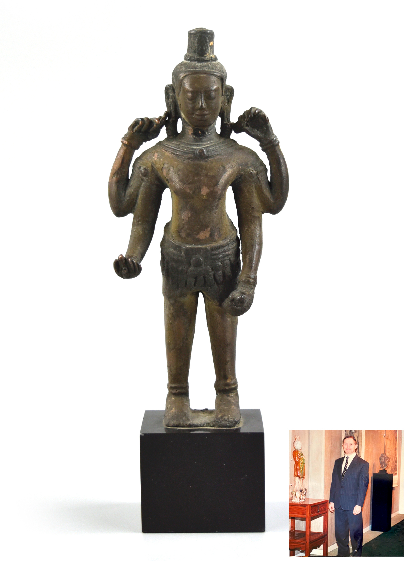 Appraisal: A South East Asian glit bronze figure standing on a