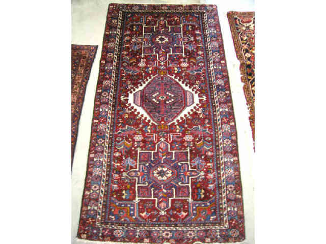 Appraisal: Heriz Persian Handmade Rug central medallion geometric design rich colors