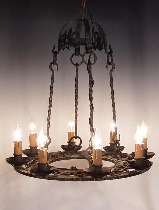 Appraisal: LIGHT WROUGHT IRON CHANDELIER Hangs '' '' dia