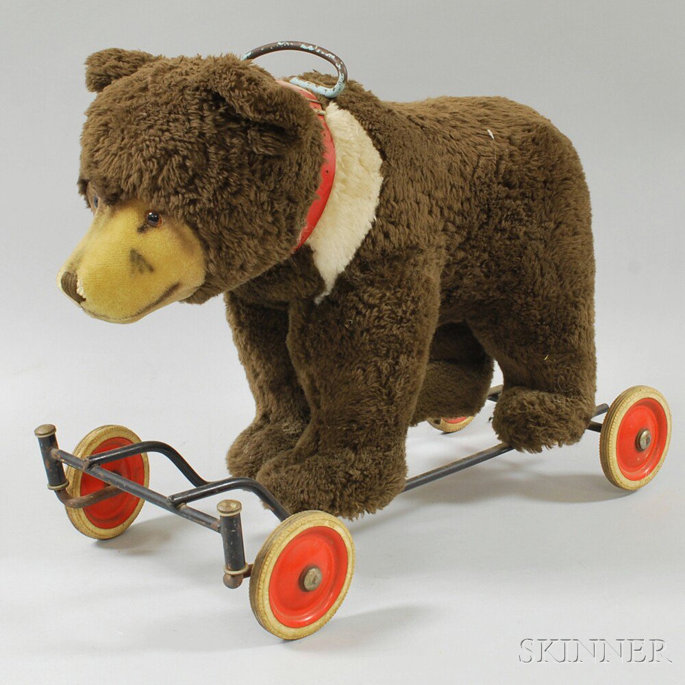 Appraisal: Steiff Ride-on Bear Cub c s brown fur and red