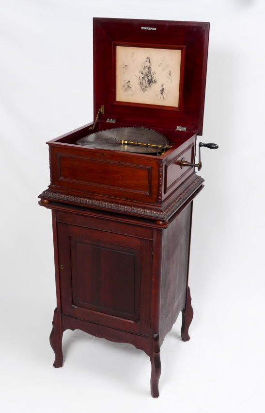 Appraisal: MAHOGANY REGINA '' MUSIC BOX AND STAND Music box with