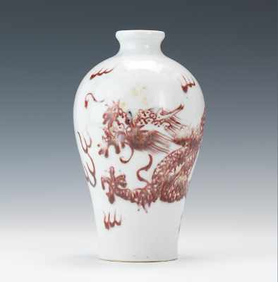 Appraisal: A Kangxi Style Porcelain Vase with Iron Red Decorations White