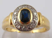 Appraisal: A yellow metal tests carat gold sapphire and diamond ring