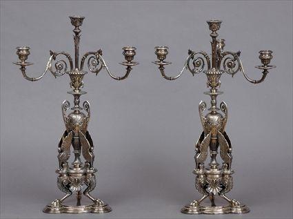 Appraisal: PAIR OF ELKINGTON CO ELECTROPLATED THREE-LIGHT CANDLABRA Each ovoid -handled