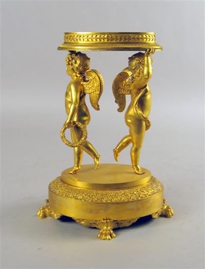 Appraisal: Louis Philippe gilt metal figural centerpiece The oval foliate cast