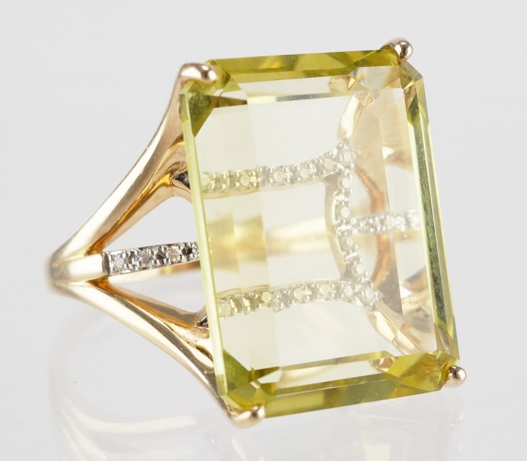 Appraisal: Large citrine accented with diamonds underneath citrine Band is marked